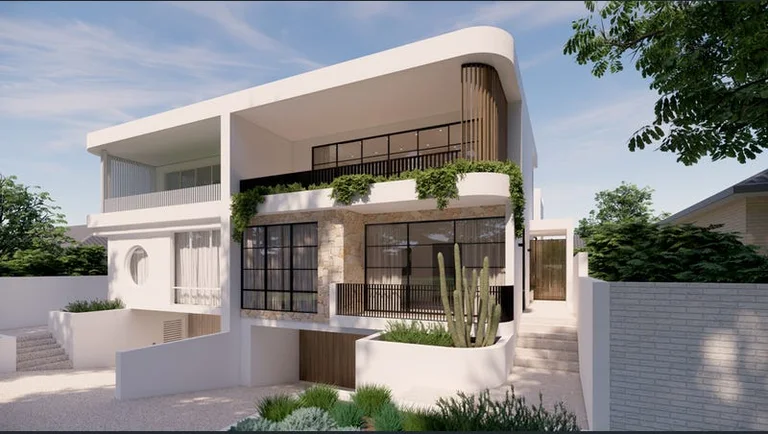 Clement home, Swanbourne — curved corner and stone-clad lower level