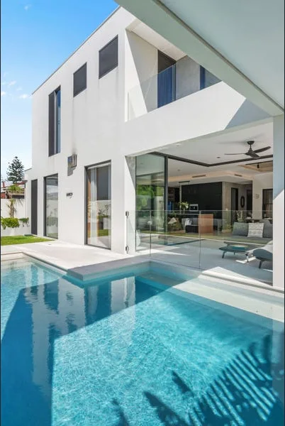 Pool terrace below the upper-level balcony, Hawkstone project